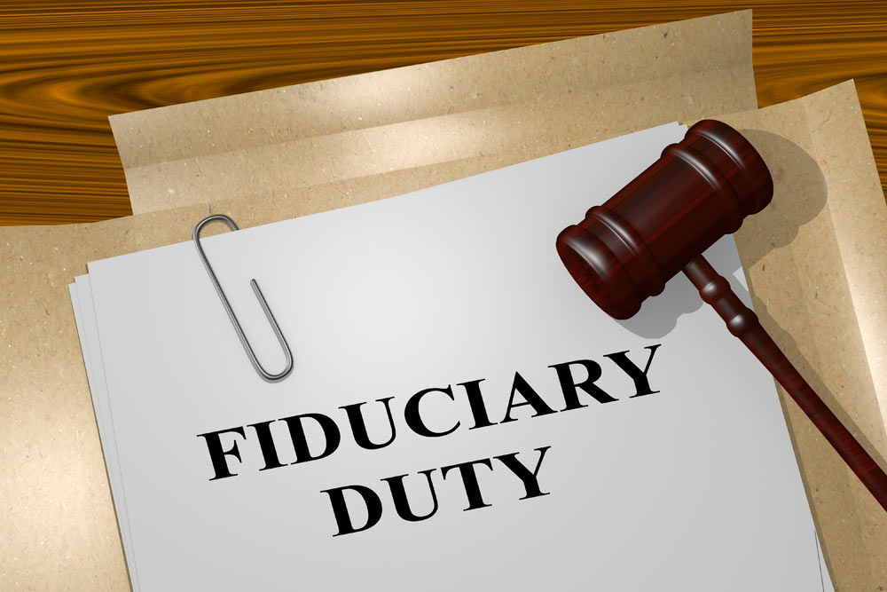 gavel on top of fiduciary documents